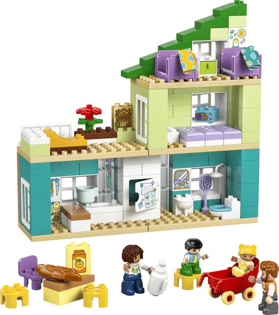 Maison Duplo avec cuisine, salle de bain et chambres, avec 4 figurines et un chariot.
