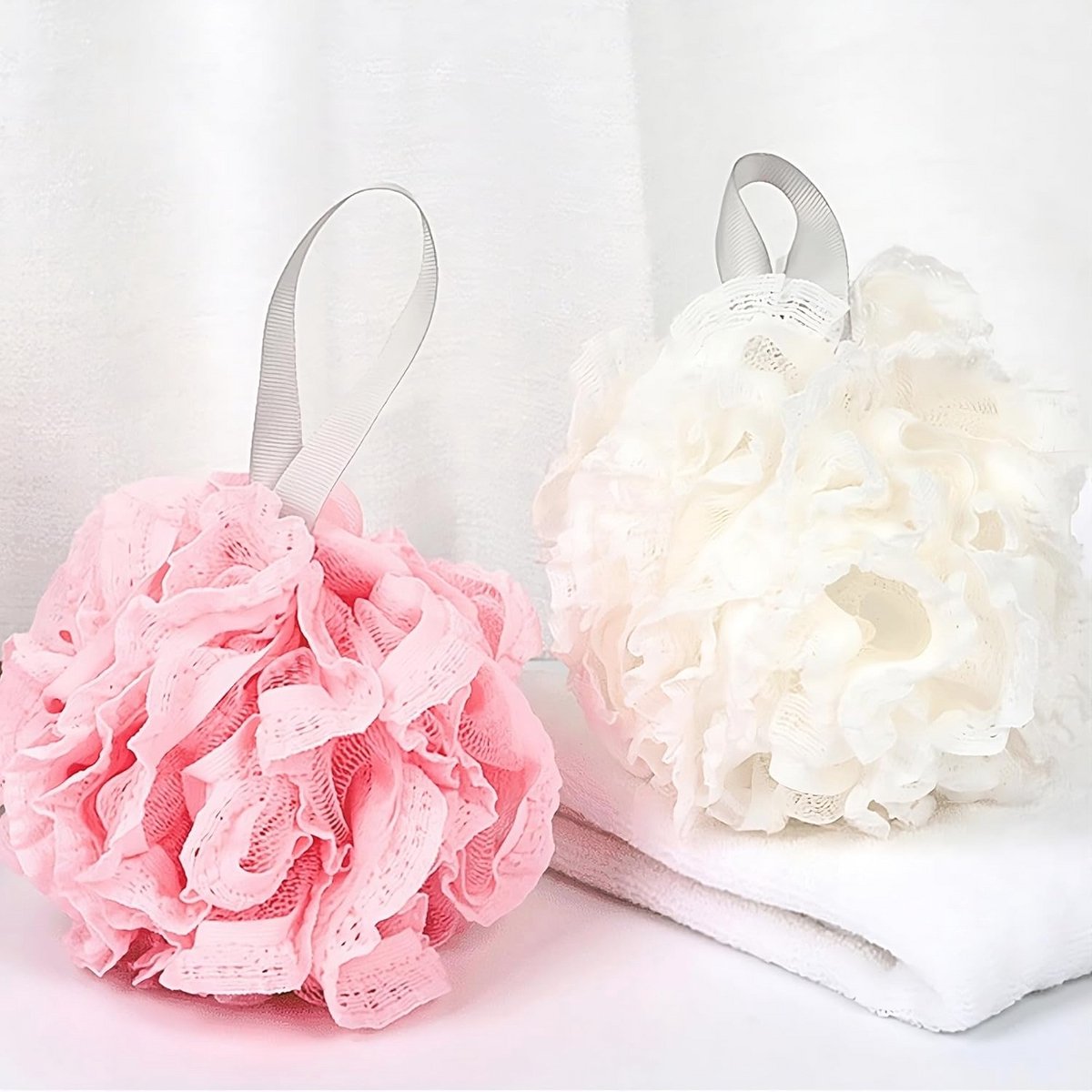 Set van 2 Douchesponzen in Roze en Wit voor een Elegante Badervaring