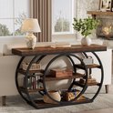 Bruine consoletafel met zwarte metalen cirkel-structuur, 5 open vakken, met decoraties zoals boeken, manden en een radio.