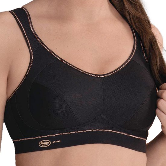 Zwarte sportbeha met koperkleurige biezen, gedetailleerde cups en Anita Active logo.