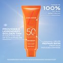 Lancaster Sun Beauty gezichtscrème met SPF 50. Oranje tube met grote 'L' en de tekst '50 SPF'.