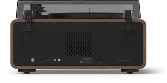 Achterkant van platenspeler met ventilatiegaten en diverse aansluitingen.