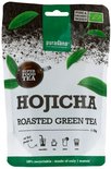 Purasana Hojicha geroosterde groene thee 75g verpakking met groene en witte accenten en bladeren.