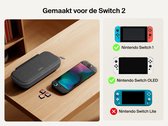 Gesloten en open hoes voor Nintendo Switch, met controllers en gamecartridges.