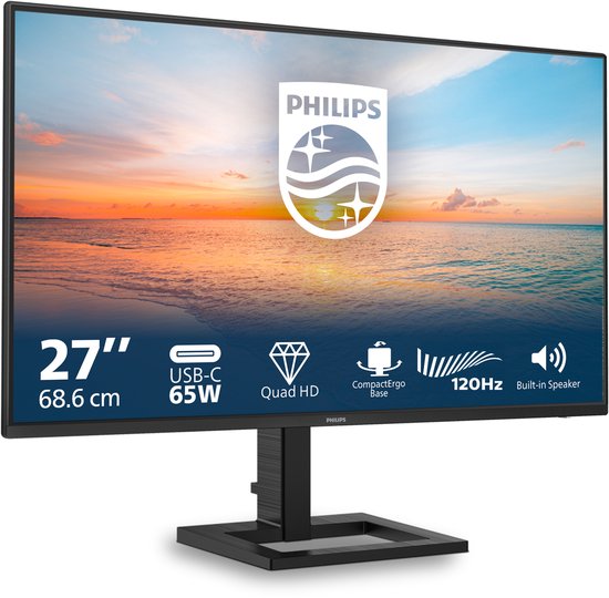 Schuine weergave van een 27-inch Philips monitor met zonsondergang. Specificaties: 27" 68.6 cm USB-C 65W Quad HD, CompactErgo Base, 120Hz, Ingebouwde luidspreker.
