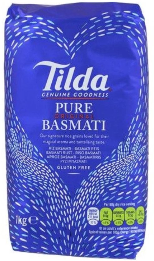 Zak Tilda Pure Original Basmati rijst van 1 kg met een blauw hartpatroon en voedingsinformatie op de voorkant.