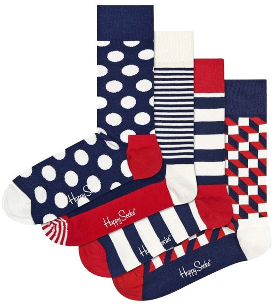 Vier Happy Socks met patronen: marineblauw met witte stippen, zwart-wit gestreept, rood-wit geblokt, en marineblauw met witte strepen.