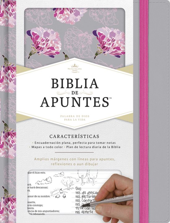 Bible grise avec le titre 'BIBLIA DE APUNTES' au centre, décorée de fleurs roses sur les côtés et d'un élastique rose.