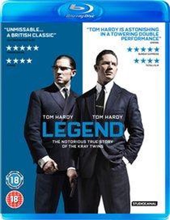 Tom Hardy in pak met stropdas, staand voor een blauwe achtergrond. Titel 'LEGEND'.