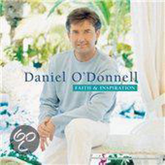 Daniel O'Donnell, "Faith & Inspiration". Man in lichtblauwe trui en witte broek.