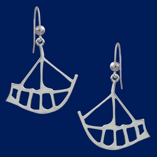 grote zilveren oorbellen ringen