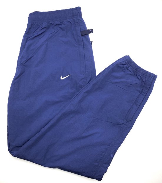 Pantalon de survêtement Nike NRG Bleu foncé (Nylon) - Taille S | bol.com
