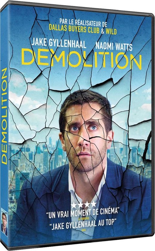 DVD hoes van de film Demolition. Grote afbeelding van Jake Gyllenhaal met gebarsten gezicht, onderaan de tekst "UN VRAI MOMENT DE CINÉMA" en "JAKE GYLLENHAAL AU TOP".