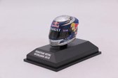 The 1:8 Diecast replica of Sebastien Vettels helmet that he wore during the GP in Interlagos 2010.

The manufacturer of the helmet is Minichamps.