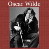 Oscar Wilde zittend met een wandelstok, gekleed in een donkere jas en das.