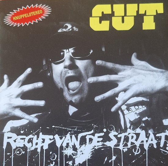 Albumcover met de tekst 'CUT' en 'Recht van de straat'. Een man met zonnebril en koptelefoon.