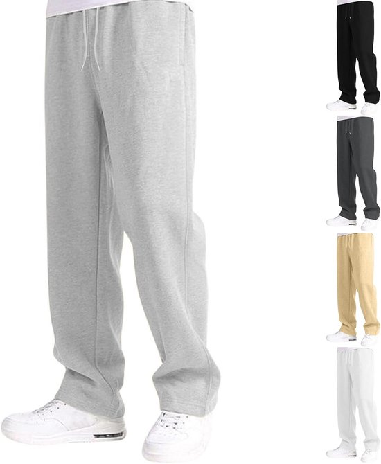 Grijze joggingbroek met trekkoord en witte sneakers. Ook getoond in andere kleuren.