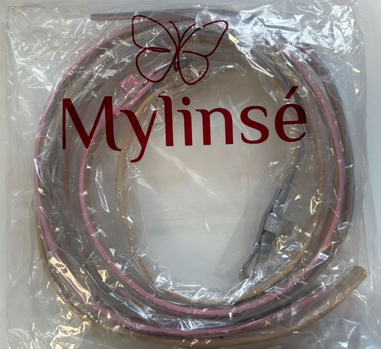 Drie Mylinsé riemen in roze, zilver en goud verpakt in plastic met vlinderlogo.