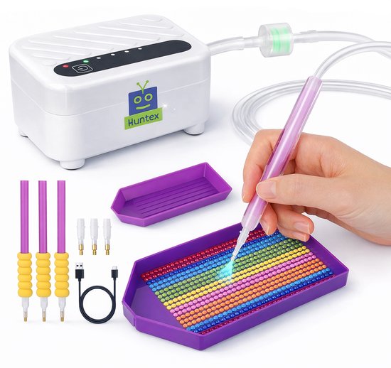 Stylo électrique violet ramasse une perle colorée d'un plateau violet, avec un appareil blanc connecté à un tuyau.