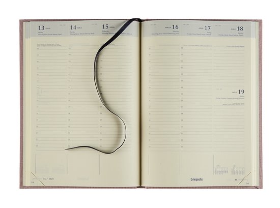 Un agenda ouvert avec une couverture rose et un ruban noir. À gauche les dates du 13 au 16 avril et à droite du 16 au 19 avril 2020.