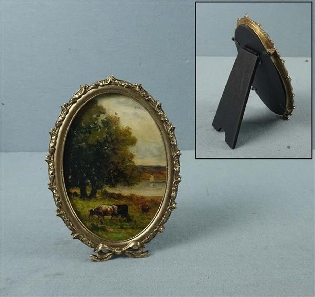 Fotolijstje Strik en bloemen ovaal ant. goud 12x2x20,5cm