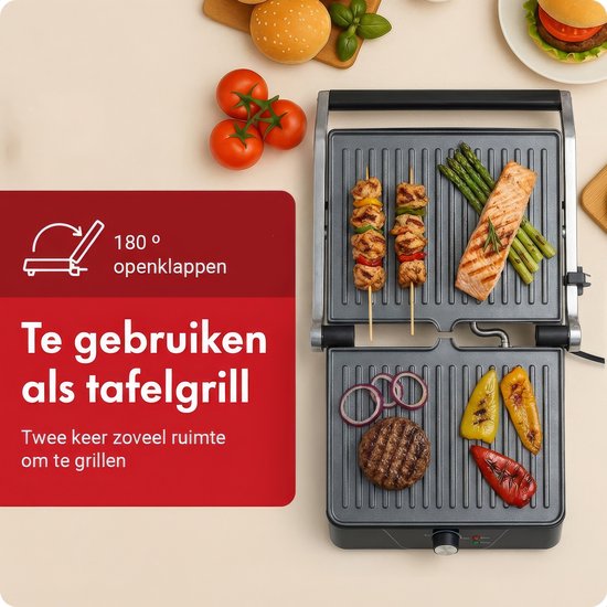 Contactgrill in 180 graden opengeklapte positie, met satés, zalm, hamburger en gegrilde groenten.