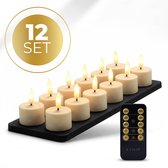 Set van 12 ivoren led waxinelichtjes op een zwart plateau, met afstandsbediening.