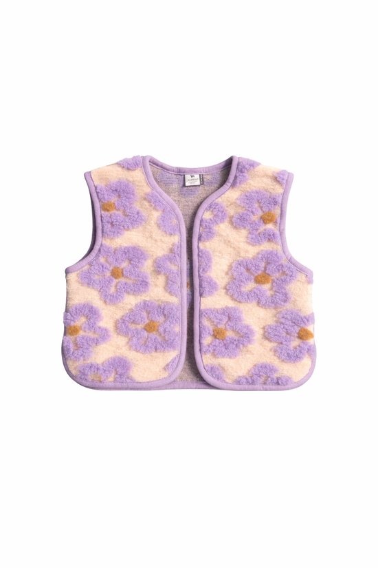 Fuchsia bloemen met gele spikkels op een lichtoranje fleece gilet met paarse bies.