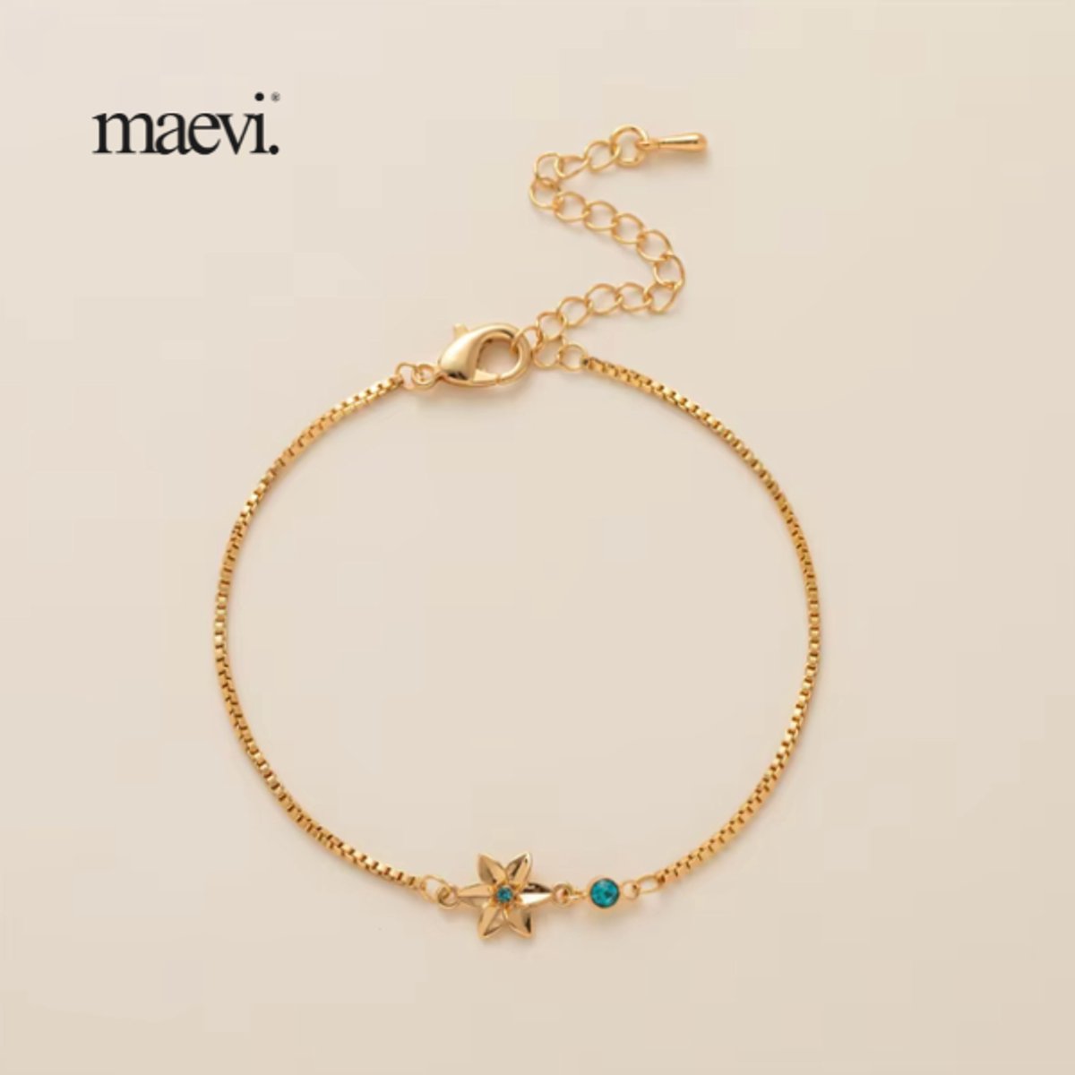 Maevi® Armband - Geboortebloem & Geboortesteen - Maand: Maart - Kleur: Goud - Hoge Kwaliteit - Luxe Armband - Kraamcadeau / Geboorte Cadeau / Verjaardag Cadeau - RVS / Roestvrijstaal - Verkleurt Niet - Armband / Bracelet - Inclusief Kado Verpakking