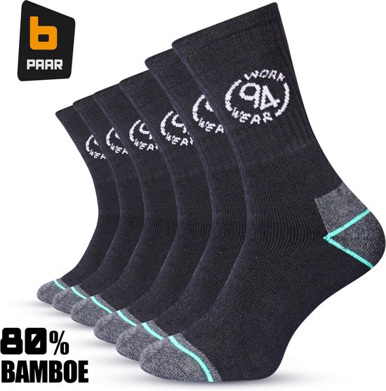 Vijf paar zwarte werksokken van bamboe met grijze tenen en hielen, en turquoise accenten.
