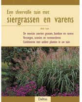 Een sfeervolle tuin met siergrassen en varens