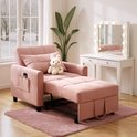 Roze slaapbank uitgeklapt tot chaise longue met een knuffelkonijn erop.
