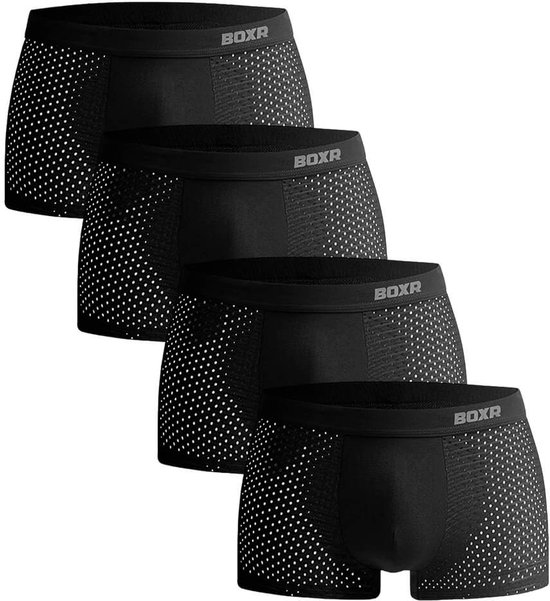 Vier zwarte boxershorts met een mesh-textuur en stippenpatroon.