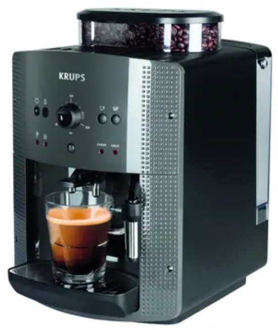 Krups volautomaat, zwart/grijs, met een kopje espresso.
