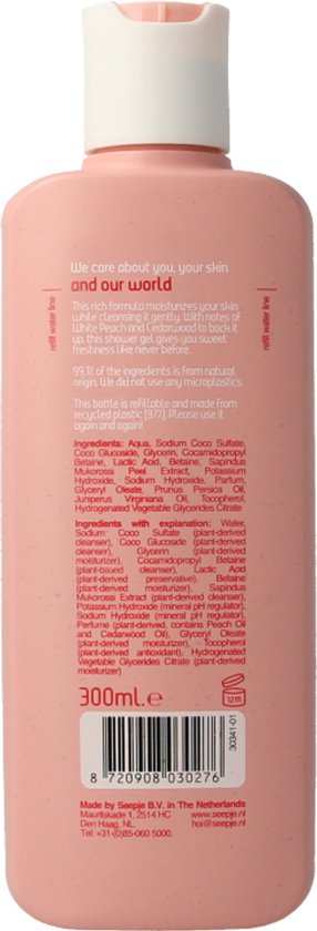 Achterkant van een roze Seepje fles douchegel met informatie over ingrediënten en gebruik.