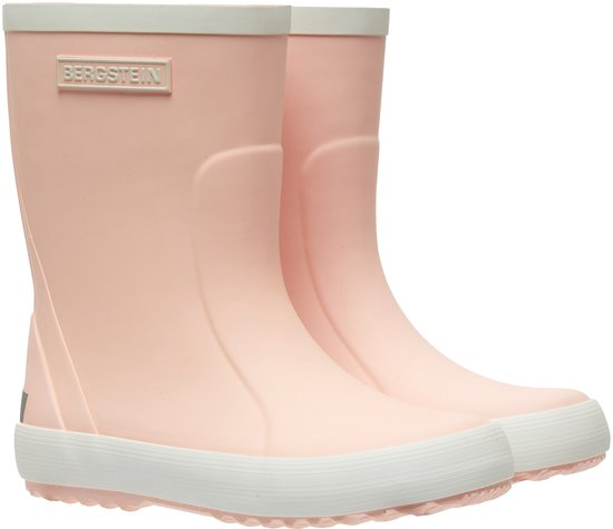 Bottes de pluie Bergstein rose pâle avec bordures blanches et logo sur le côté.
