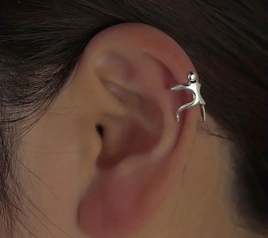 GoedeDoelen.Shop | Klem-Oorbel Human | Zilverkleurig | Ear Cuff | Afmeting 1 x 1 CM | Human | Mens | Oorsieraad | Statement Sieraad | Wellness-House