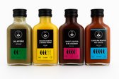 Hete Sauzen Pakket met 4 Hot Sauces - Carolina Reaper, Jalapeño, Madame Jeanette, Ghost Pepper - Handgemaakt in Nederland - Vegan, Glutenvrij, Keto friendly - Natuurlijk van de lokale boer - Kerst kado, Sinterklaas kado - Saus Met Pit - 4x 100ml