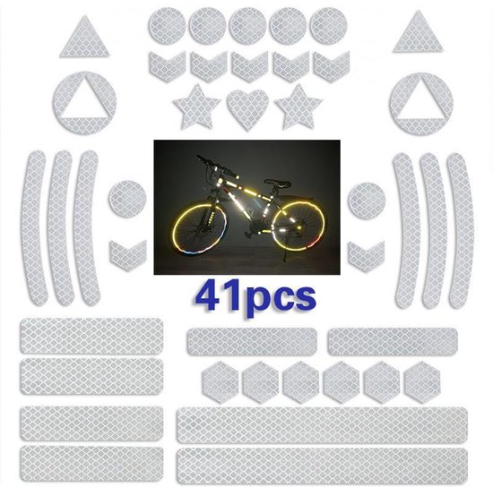 41 reflecterende stickers in verschillende vormen, inclusief een fiets met stickers bij daglicht en donker.