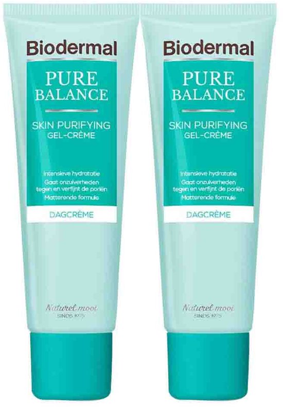 Twee Biodermal Pure Balance Skin Purifying Dagcrème tubes met turquoise dop en lichtblauwe tubes.