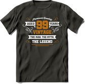 99 Jaar Legend T-Shirt | Goud - Wit | Grappig Verjaardag en Feest Cadeau Shirt | Dames - Heren - Unisex | Tshirt Kleding Kado | - Donker Grijs - XXL