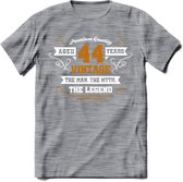 44 Jaar Legend T-Shirt | Goud - Wit | Grappig Verjaardag en Feest Cadeau Shirt | Dames - Heren - Unisex | Tshirt Kleding Kado | - Donker Grijs - Gemaleerd - S