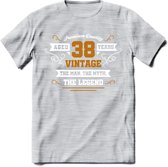 38 Jaar Legend T-Shirt | Goud - Wit | Grappig Verjaardag en Feest Cadeau Shirt | Dames - Heren - Unisex | Tshirt Kleding Kado | - Licht Grijs - Gemaleerd - M