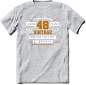 48 Jaar Legend T-Shirt | Goud - Wit | Grappig Verjaardag en Feest Cadeau Shirt | Dames - Heren - Unisex | Tshirt Kleding Kado | - Licht Grijs - Gemaleerd - S