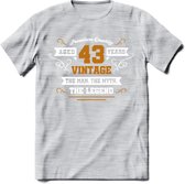 43 Jaar Legend T-Shirt | Goud - Wit | Grappig Verjaardag en Feest Cadeau Shirt | Dames - Heren - Unisex | Tshirt Kleding Kado | - Licht Grijs - Gemaleerd - XL