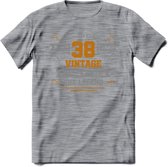 38 Jaar Legend T-Shirt | Goud - Zilver | Grappig Verjaardag Cadeau | Dames - Heren | - Donker Grijs - Gemaleerd - XXL