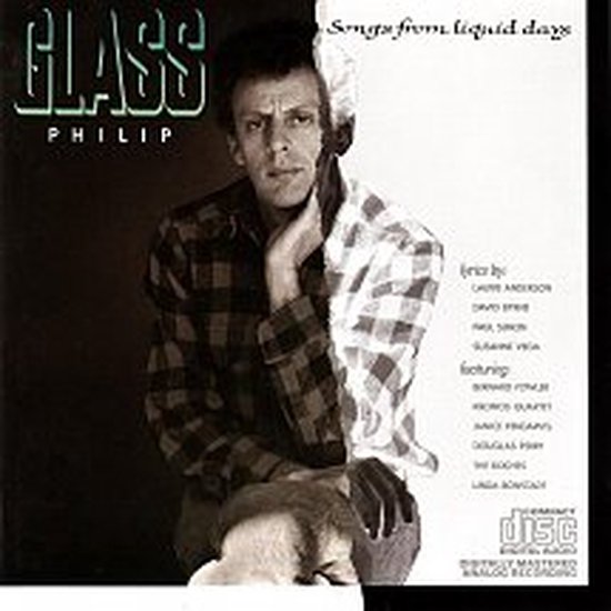 Philip Glass's 'Songs from Liquid Days' albumhoes. Een zwart-witfoto van Philip Glass, gekleed in een geruite blouse.