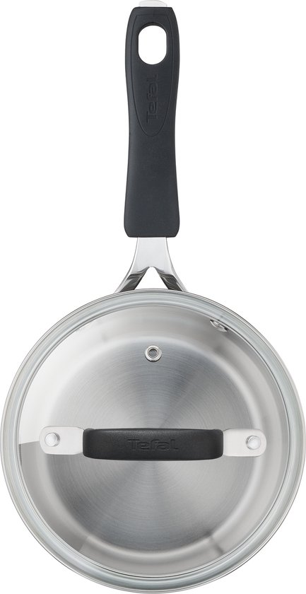 RVS steelpan met glazen deksel en zwarte handgreep, gezien vanaf boven.