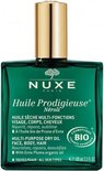 Groene Nuxe Huile Prodigieuse Néroli fles met gouden dop.