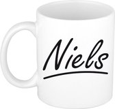 Niels naam cadeau mok / beker met sierlijke letters - Cadeau collega/ vaderdag/ verjaardag of persoonlijke voornaam mok werknemers